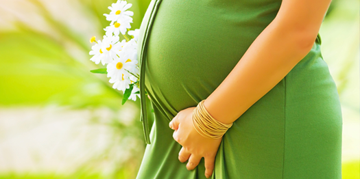 pregnant woman in green